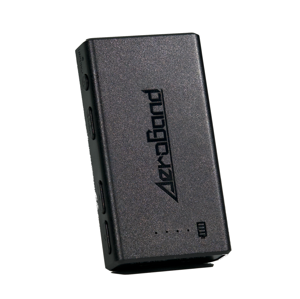 Black Aeroband PocketDrum adapter with pairing button, volume controls, and battery indicator.