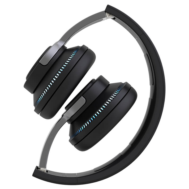Black over-ear headphones with silver accents and subtle blue LED lighting along the earcups.